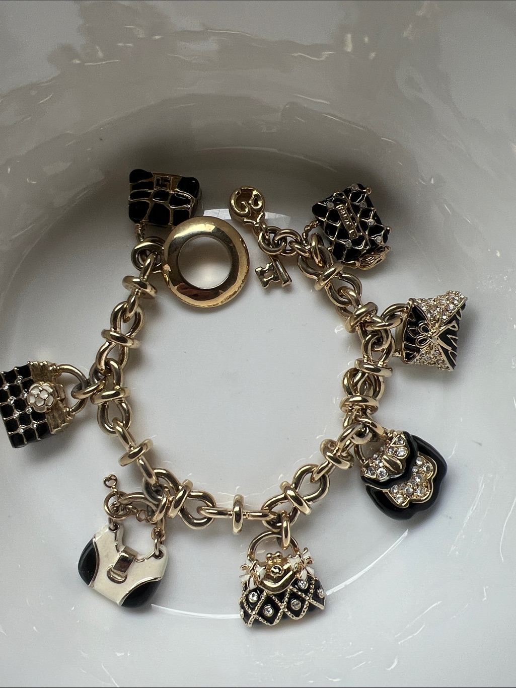 St. John Collection 1990âs Gold And Black Enamel Charm Bracelet